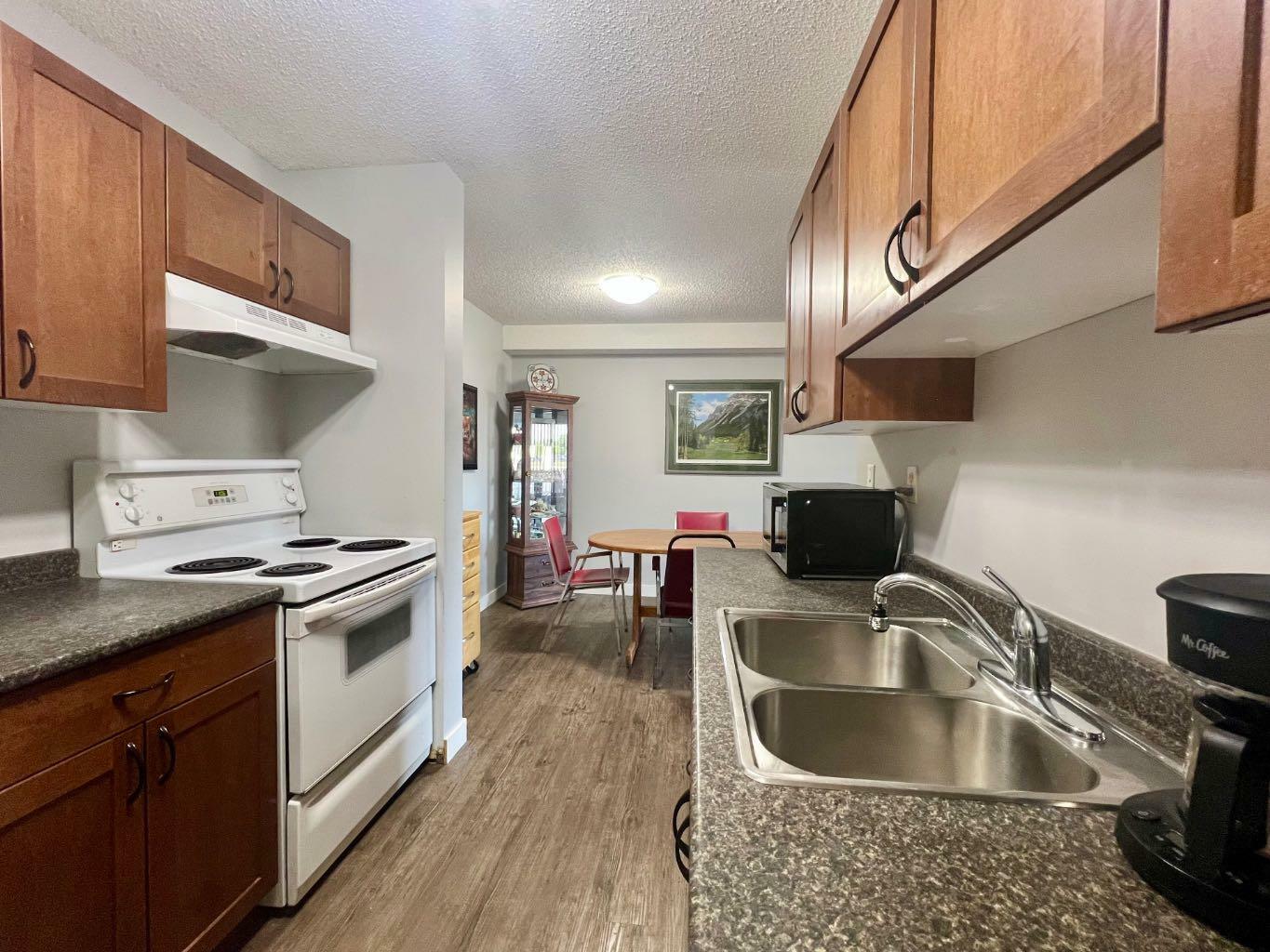 Property Photo: 19 Bennett Street 104 AB T4R 1V3