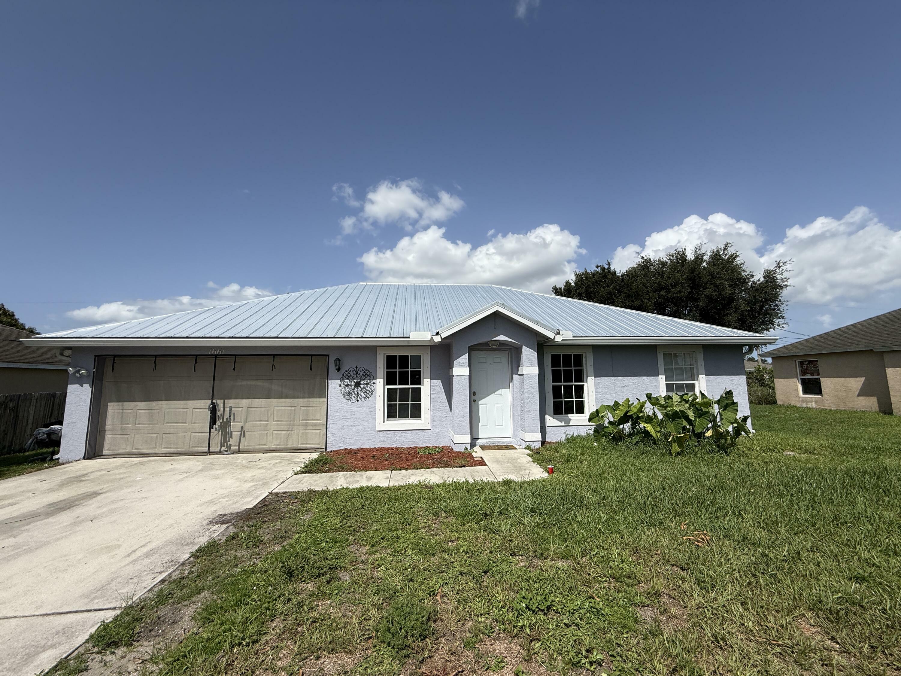Property Photo: 1661 SW Cameo Boulevard FL 34953