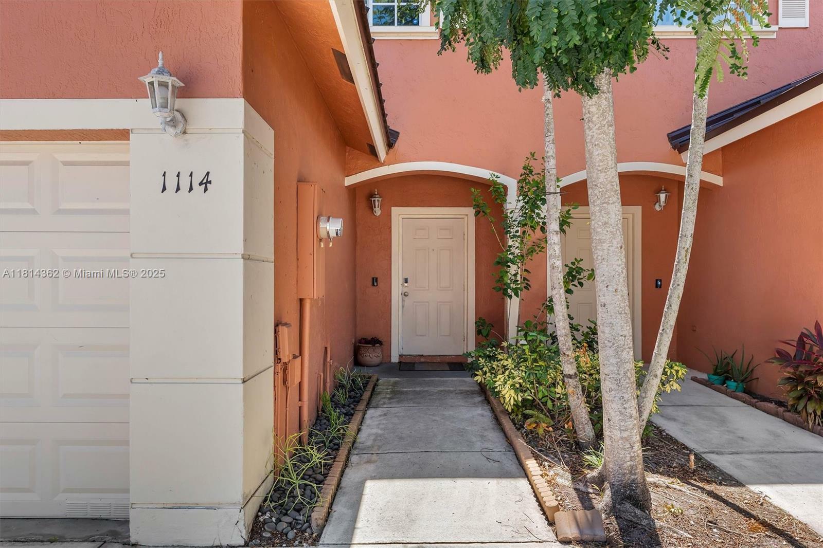 Property Photo: 1114 NW 100th Ave FL 33024