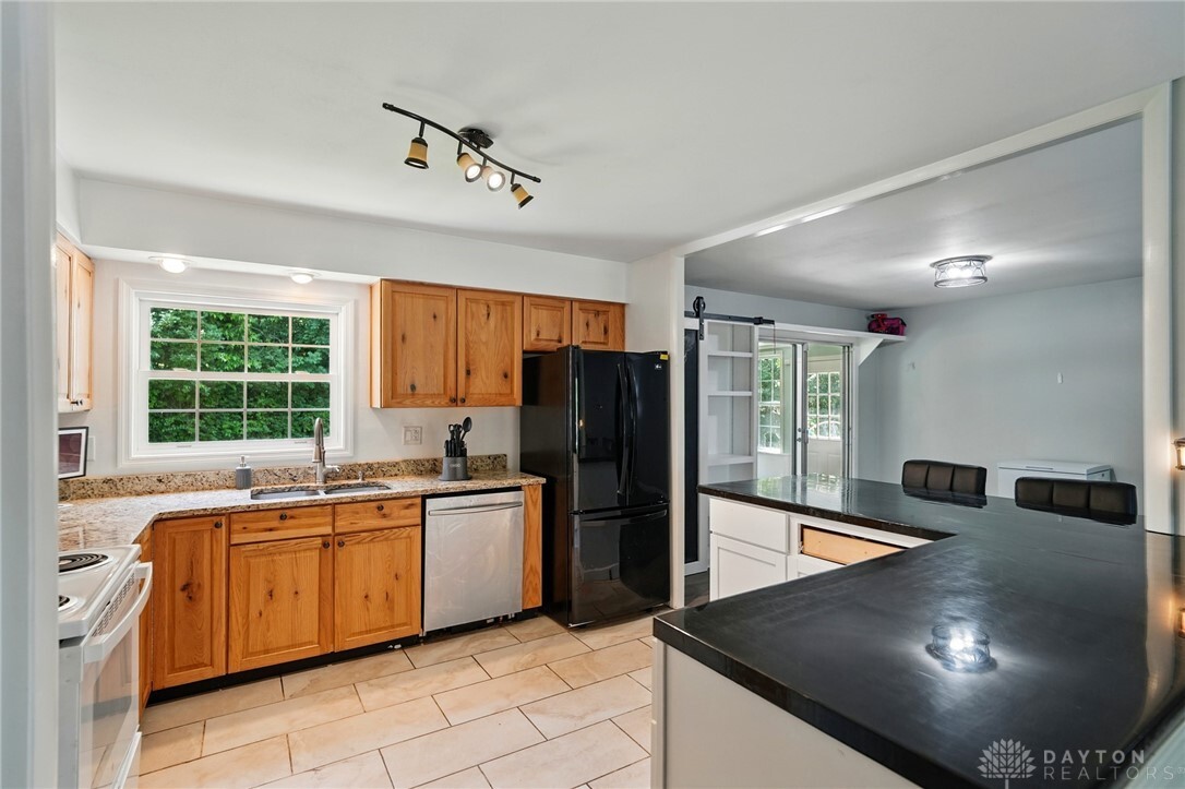 Property Photo: 6145 Tanager Way OH 45449
