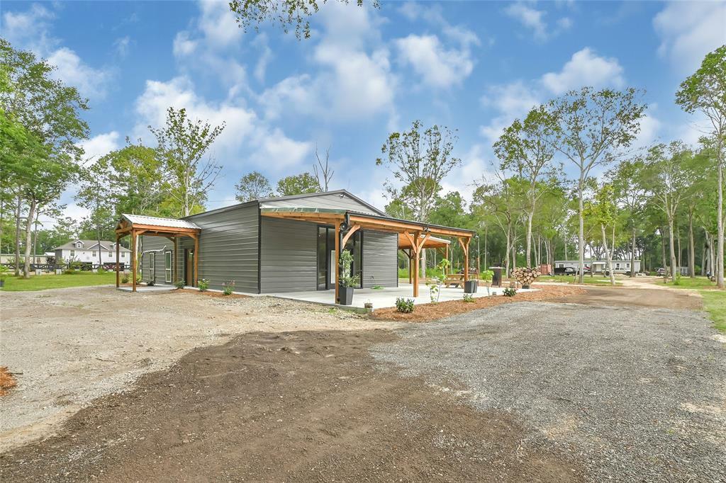 Property Photo: 265 County Road 318 TX 77327