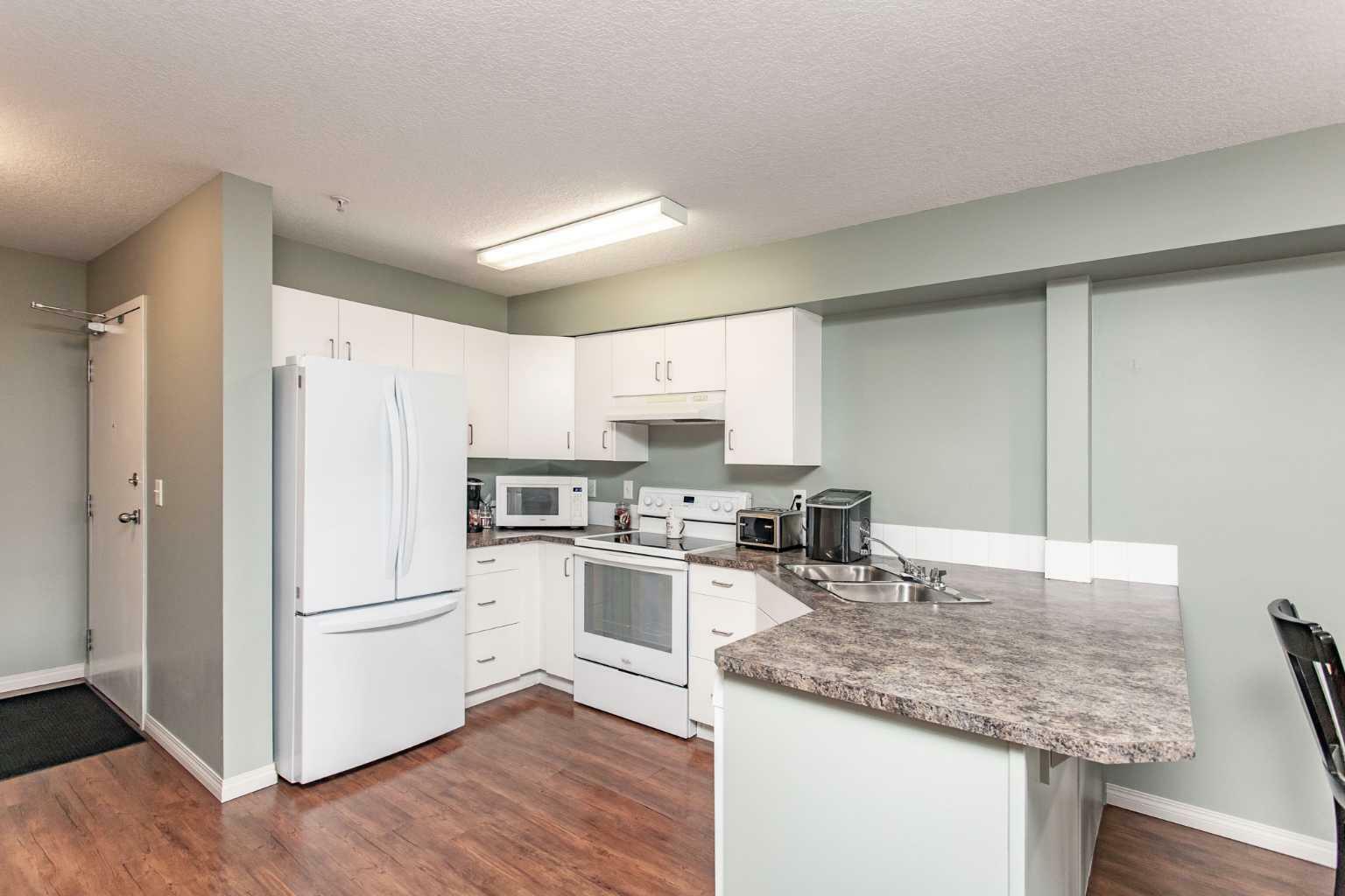 Property Photo: 80A Kelloway Crescent 212 AB T4P 4G7