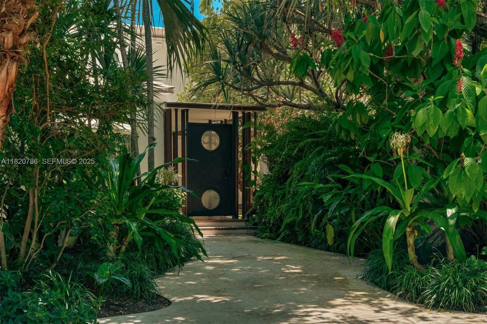 Property Photo: 6165 Pine Tree Dr FL 33140