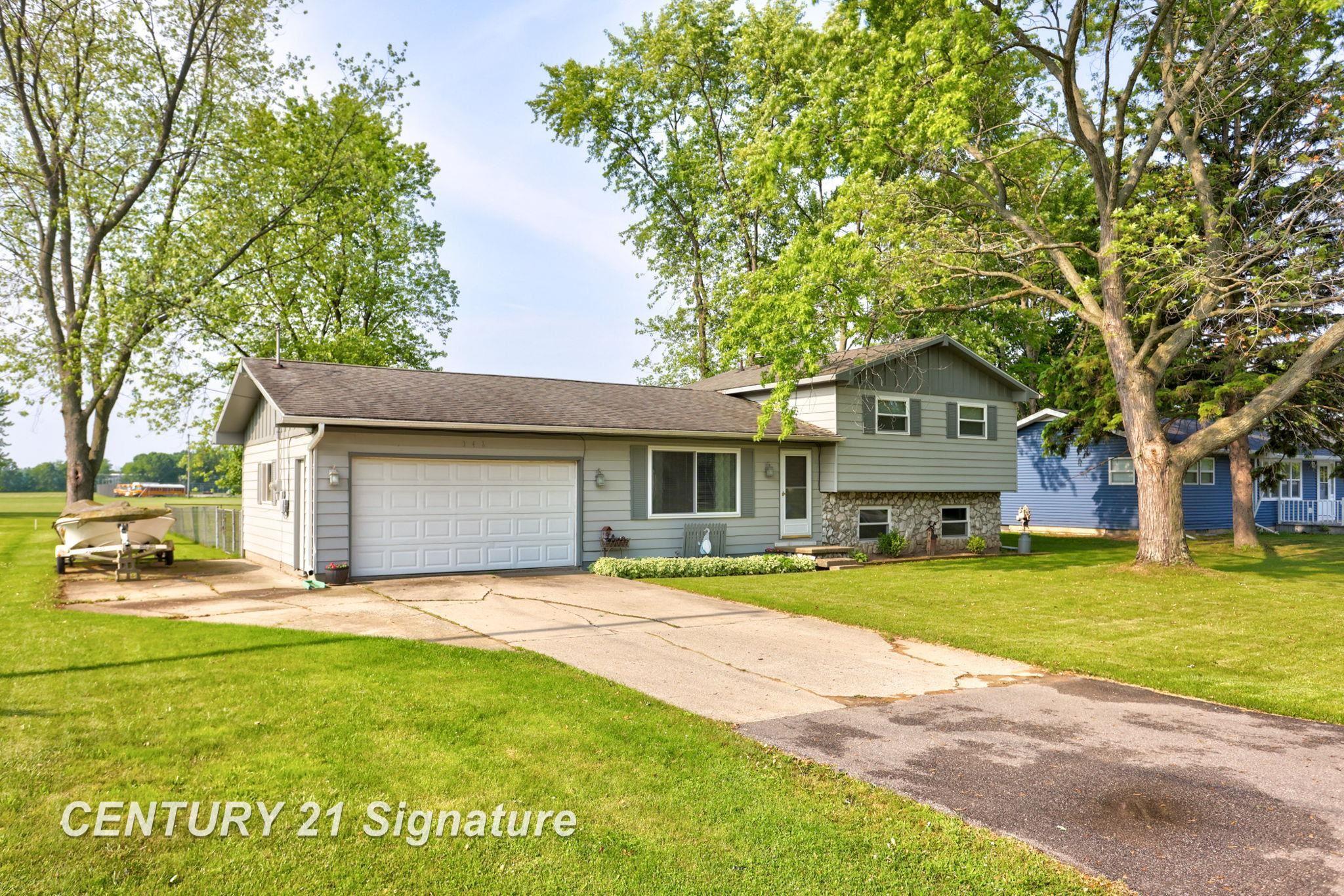 Property Photo:  942 Wheelock Street  MI 48623 