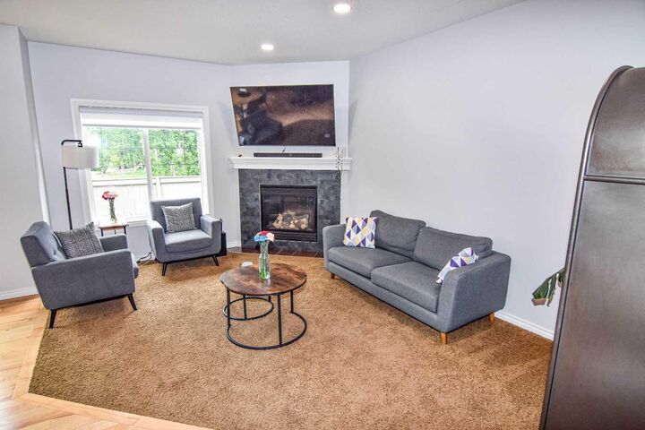 Property Photo:  100 Coopers Common SW 130  AB T4B 3C7 