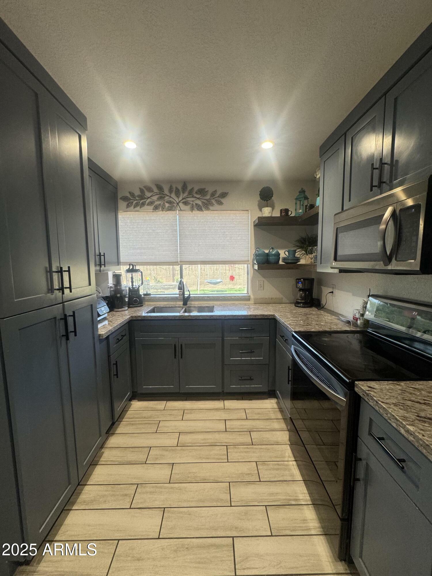 Property Photo:  10436 W Ruth Avenue  AZ 85345 