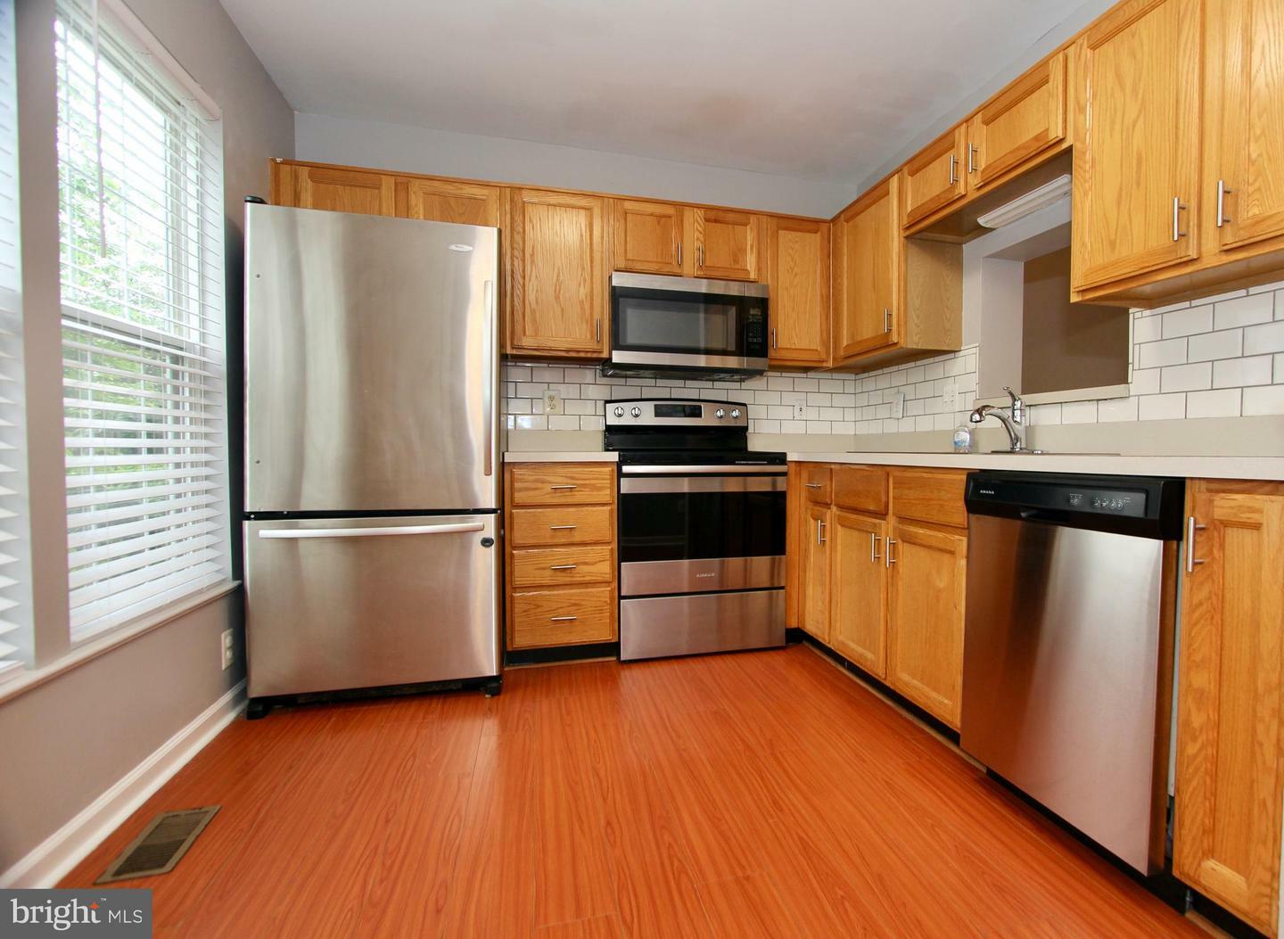 Property Photo:  4605 Club Cart Circle  VA 22408 