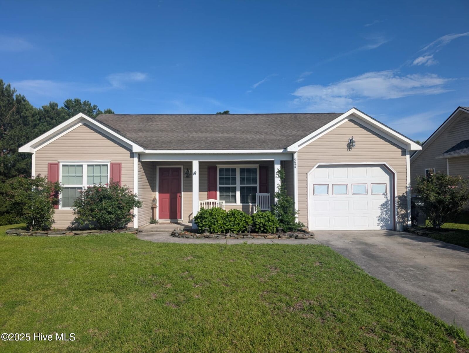 Property Photo:  224 Red Carnation Drive  NC 28445 