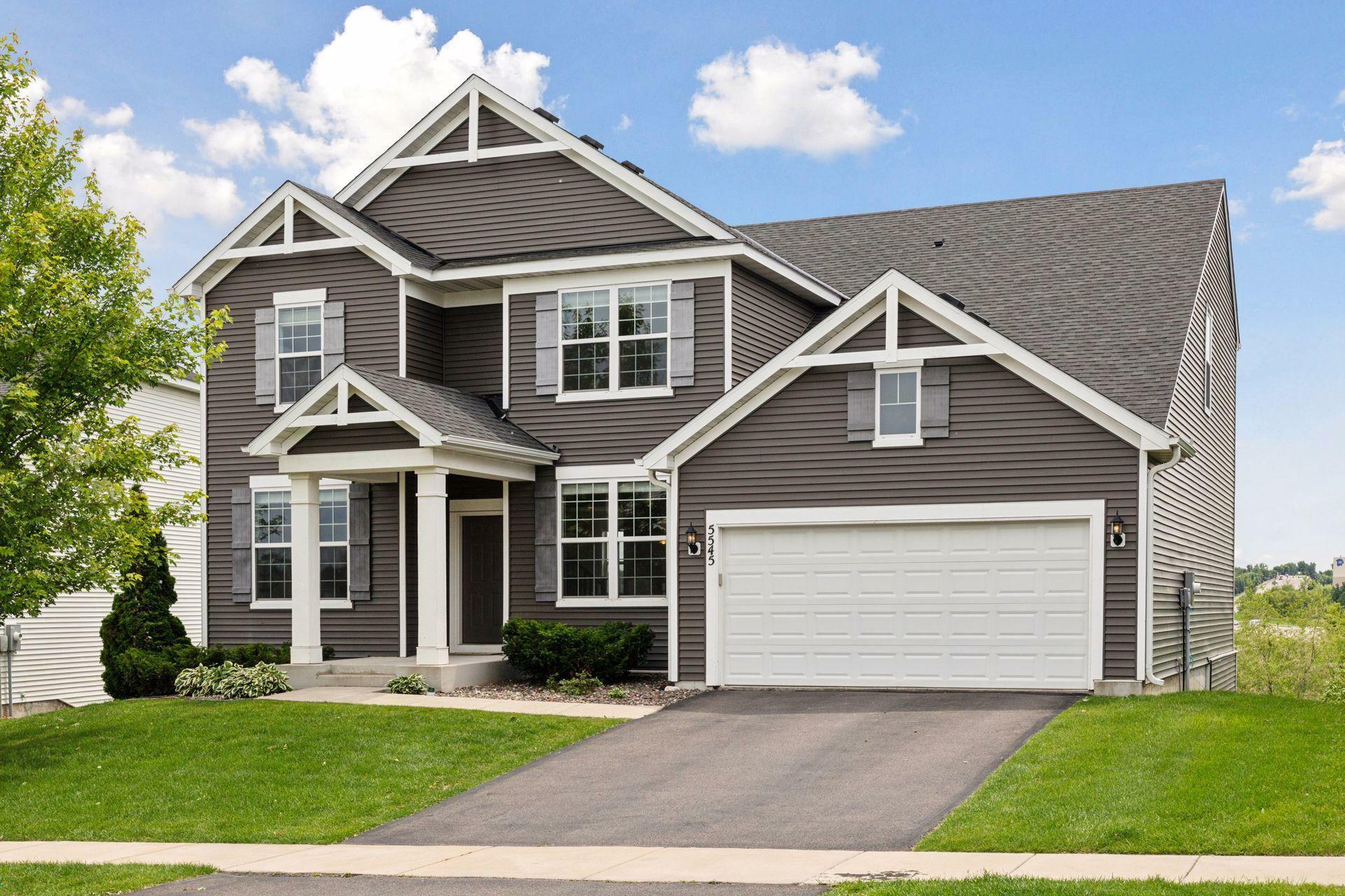 Property Photo: 5545 Queensland Lane N MN 55446