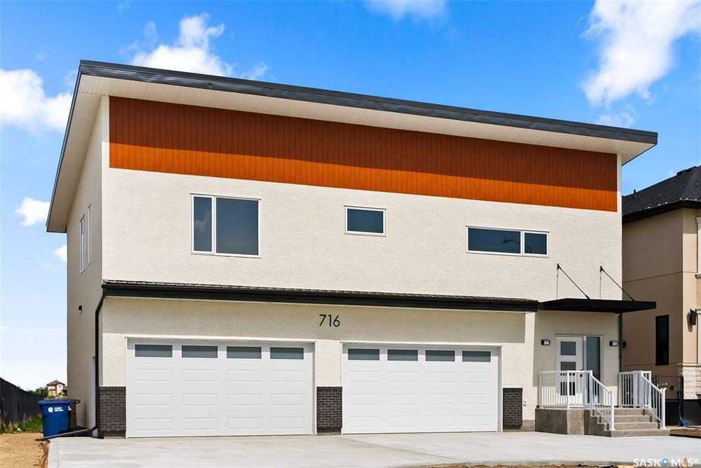 Property Photo: 716 Emerald Park Road SK S4L 0C4