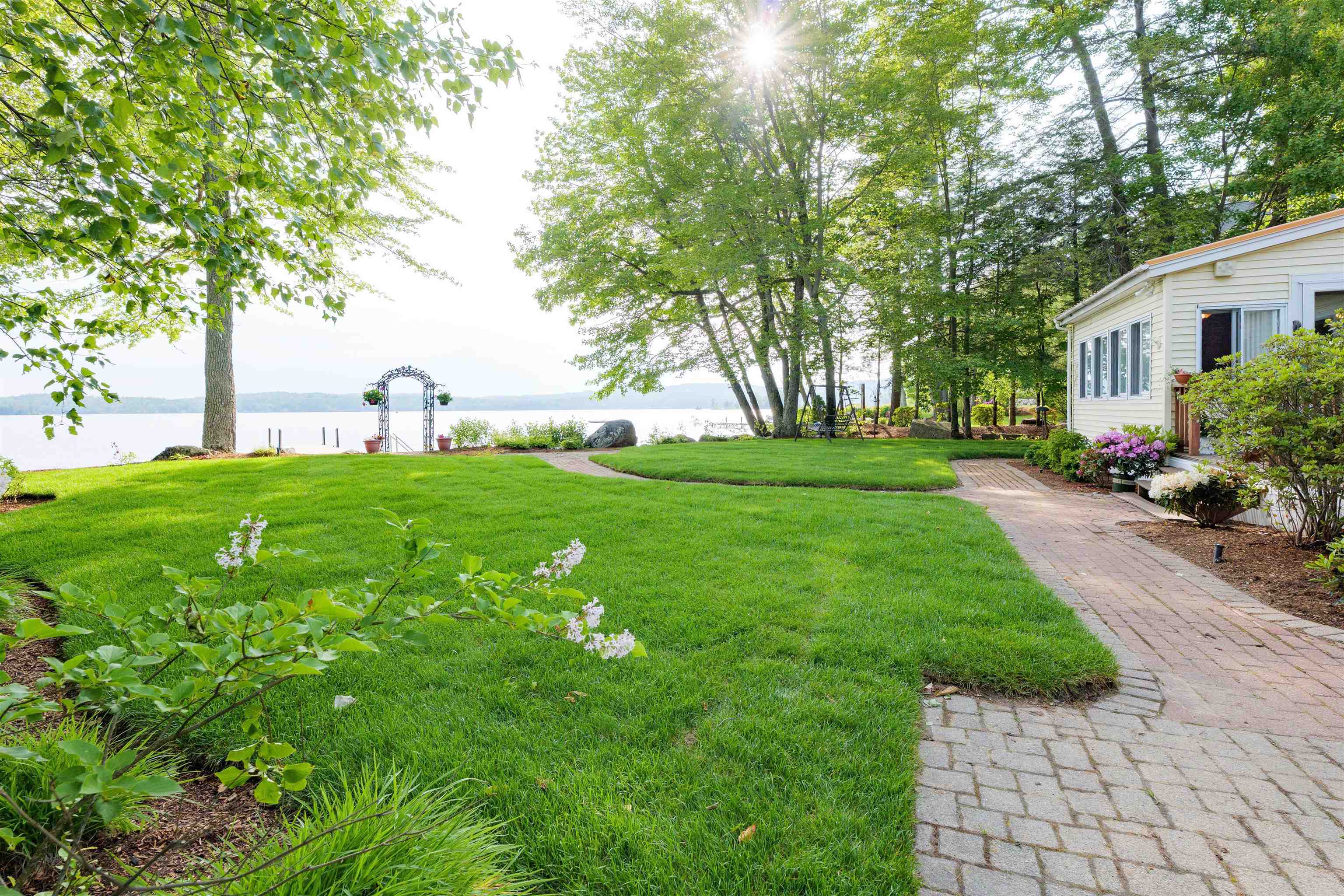 Property Photo: 18 Black Cat Island Road NH 03254