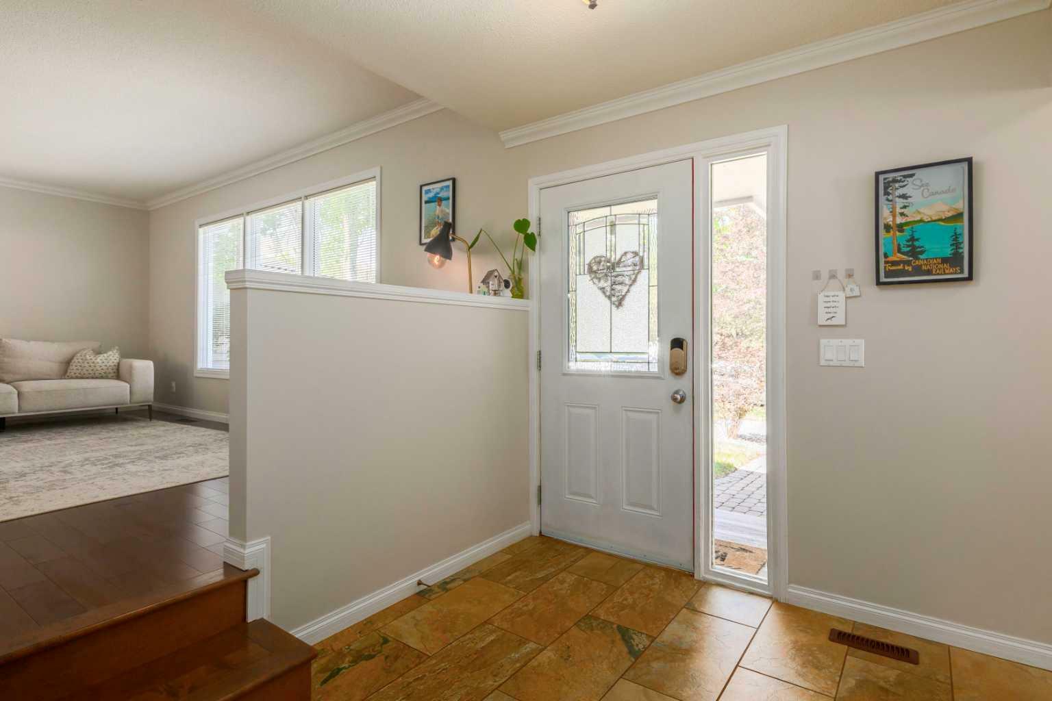 Property Photo: 108 Oakside Circle SW AB T2V 4H1