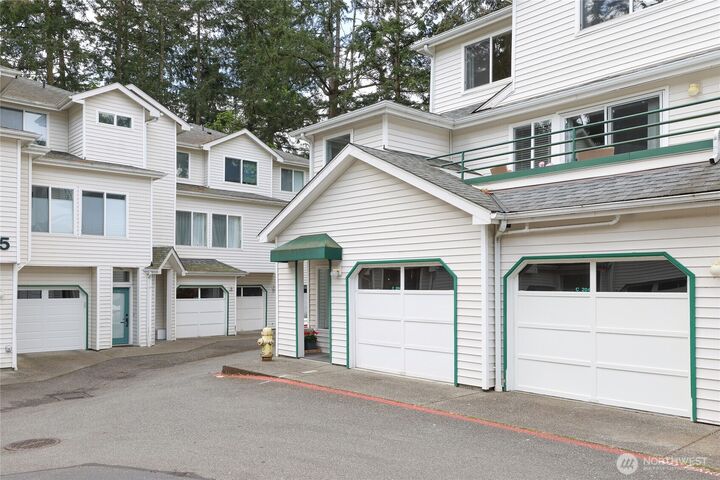 Property Photo:  16219  Northup Way C-204  WA 98008 