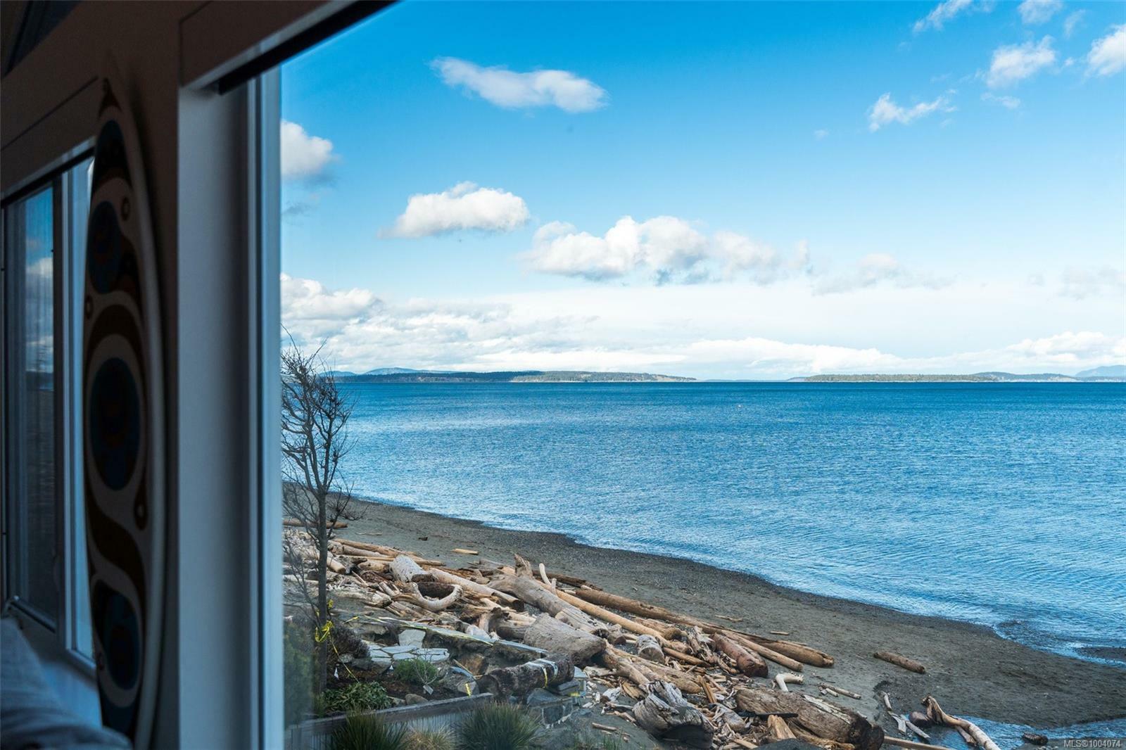 Property Photo: 5091 Cordova Bay Rd BC V8Y 2K1