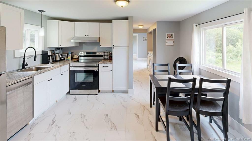 Property Photo: 14 Tamarack Drive NB E3B 6T1