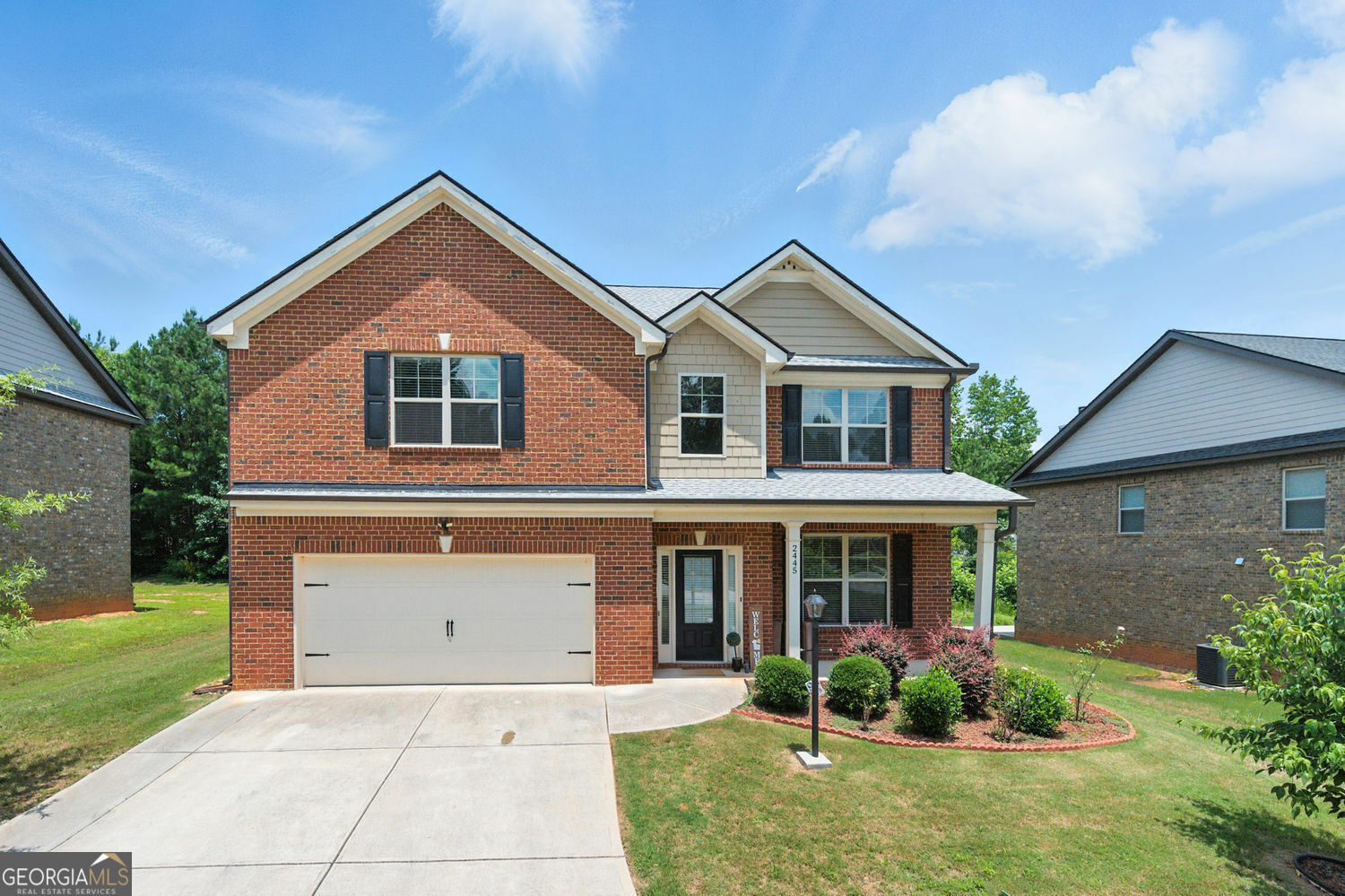Property Photo: 2445 Whitehead Place Drive GA 30024