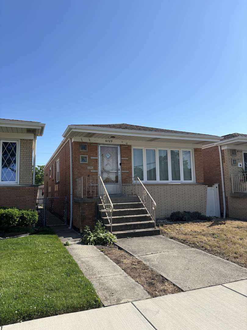 Property Photo: 6709 W 59th Street IL 60638