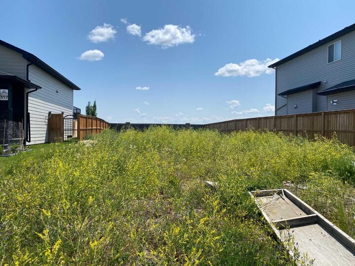 Property Photo: 321 Rivergrove Chase W AB T1K 8E8