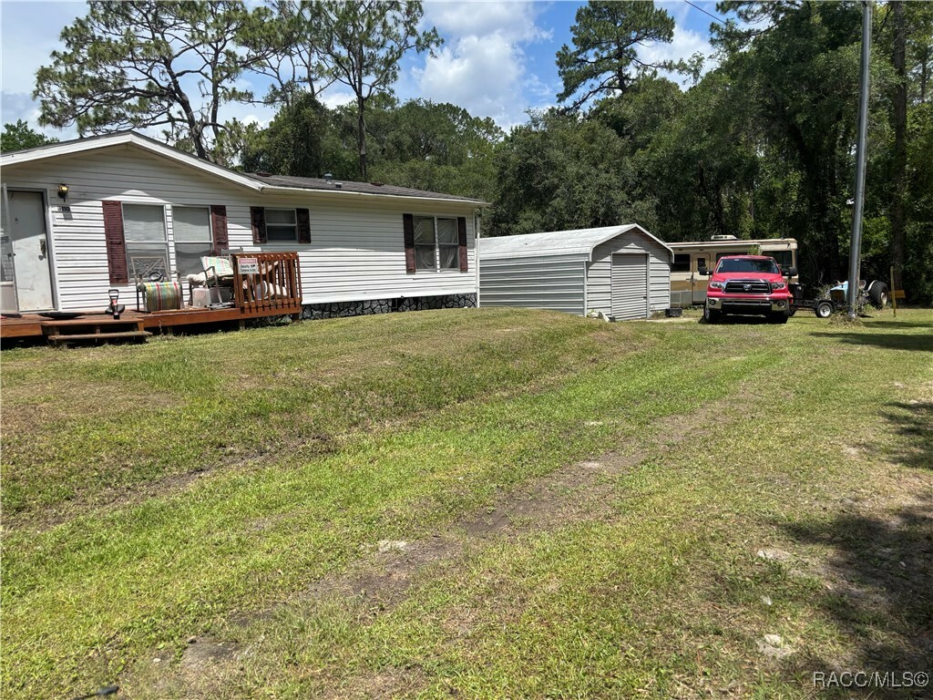 Property Photo: 3110 NE 147th Terrace FL 34488