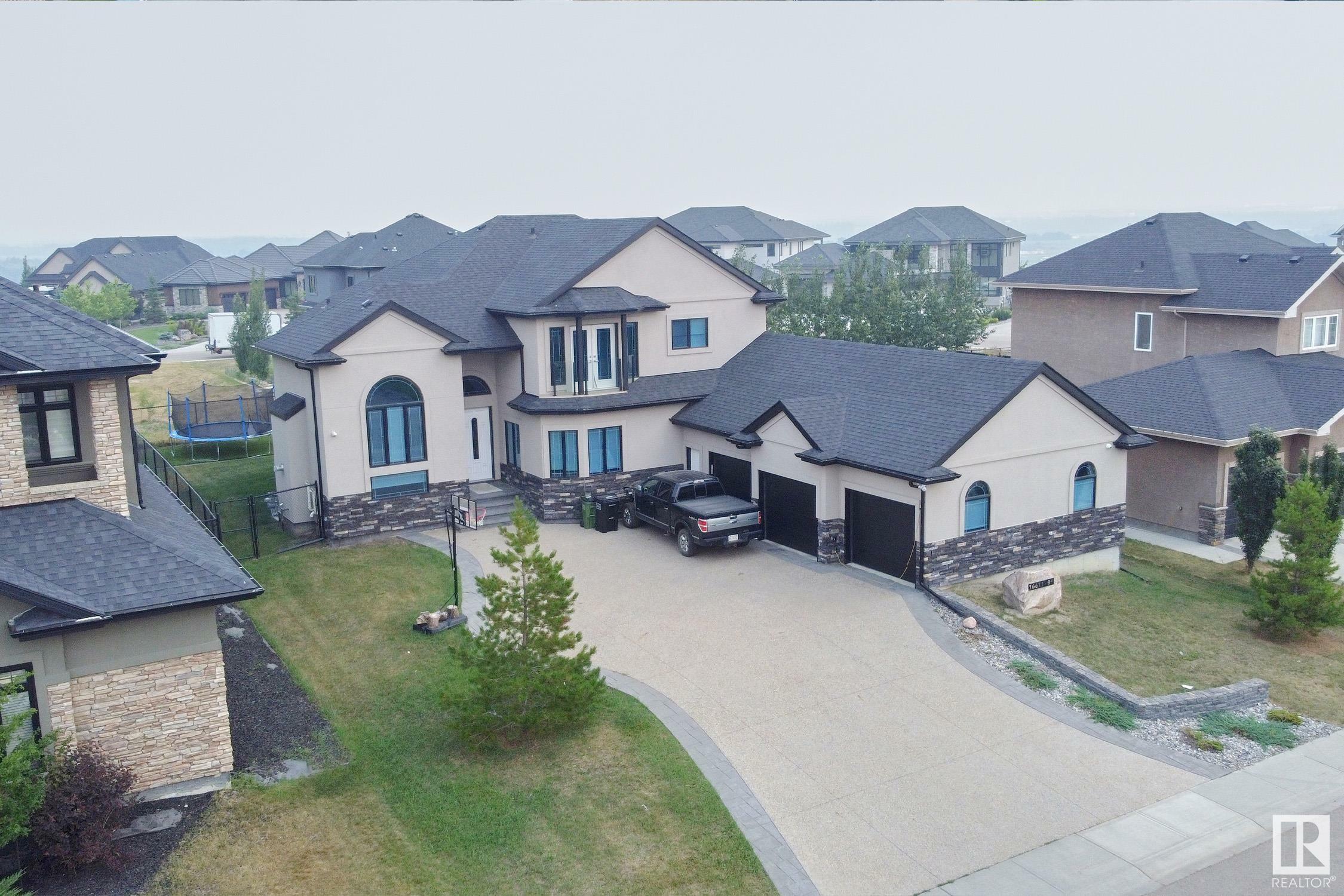 Property Photo: 16611 9 St NE AB T5Y 0P6