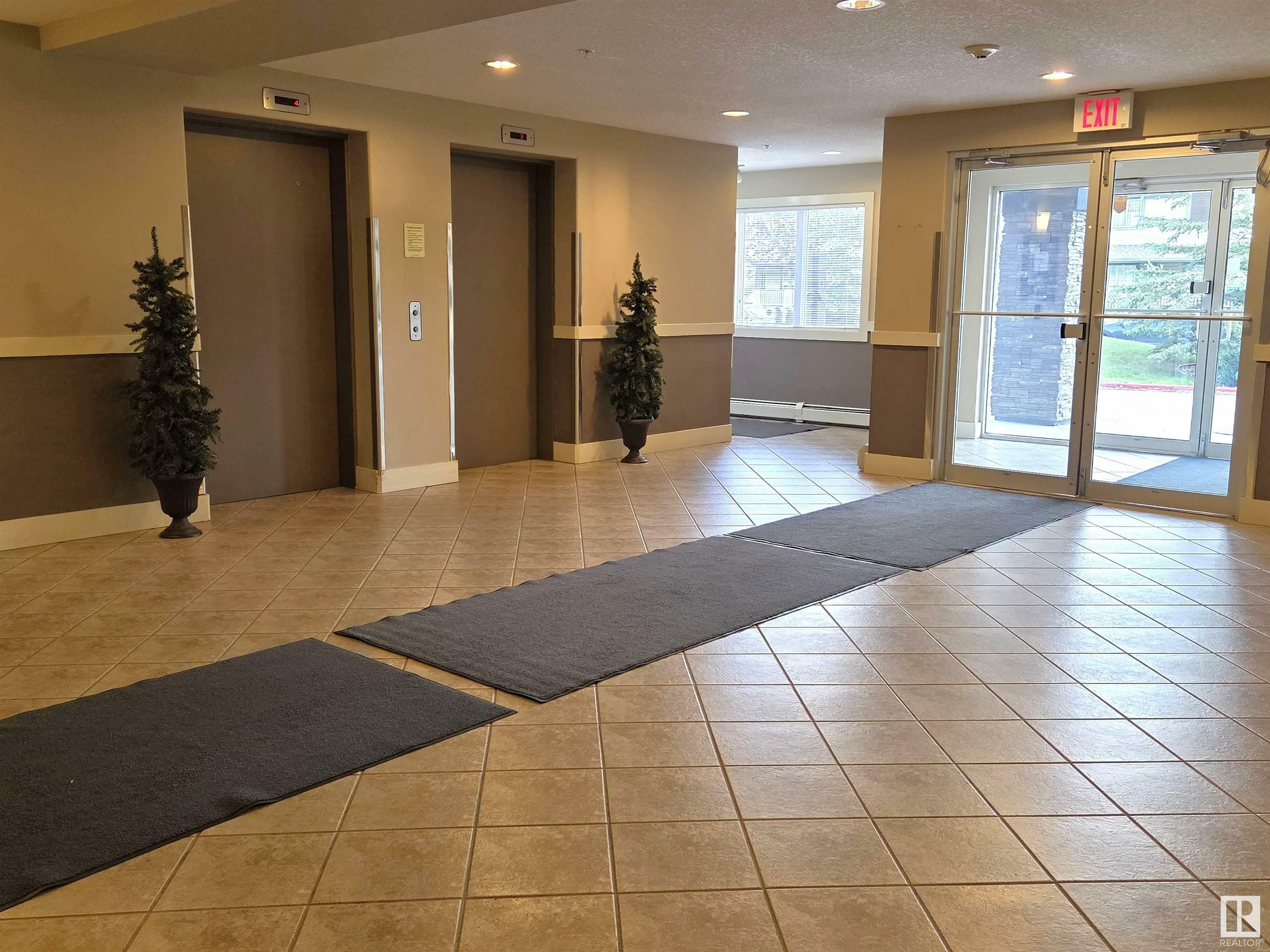 Property Photo: 646 McAllister Loop SW 112 AB T6W 0B5