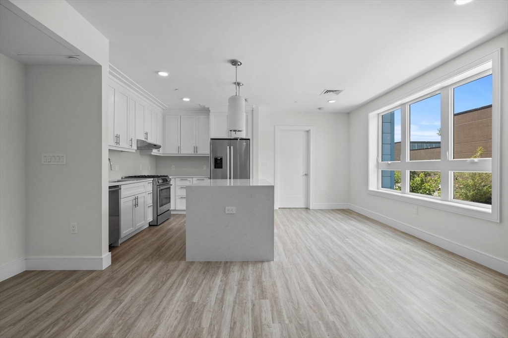 Property Photo:  301 Border Street 211  MA 02128 