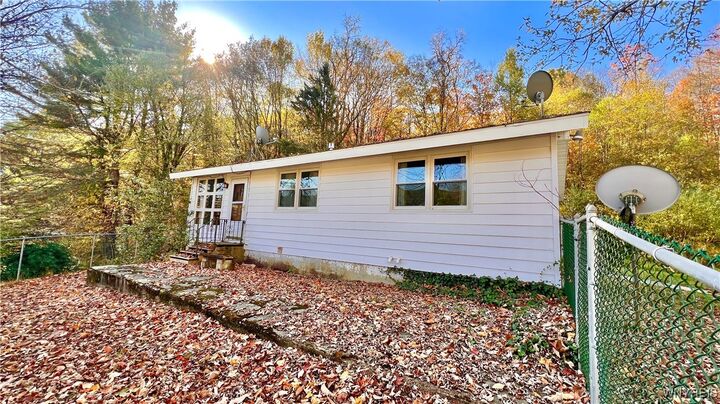 Property Photo: 8905 W Bucktooth Run Road NY 14755