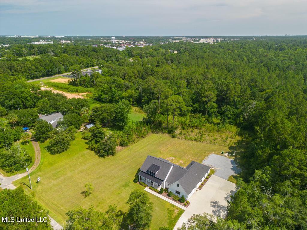 Property Photo:  16043 W Dedeaux Road  MS 39503 