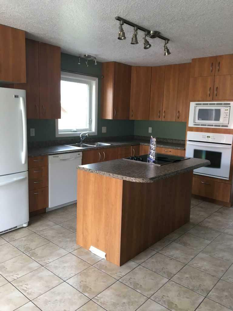 Property Photo: 10417 9 Street AB T8S 1N9