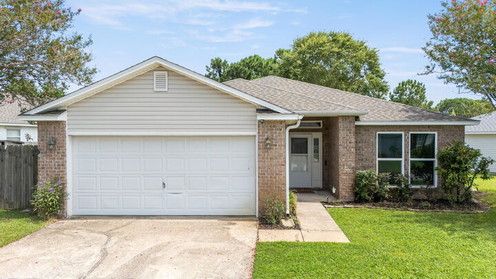 Property Photo: 6318 Heronwalk Drive FL 32563