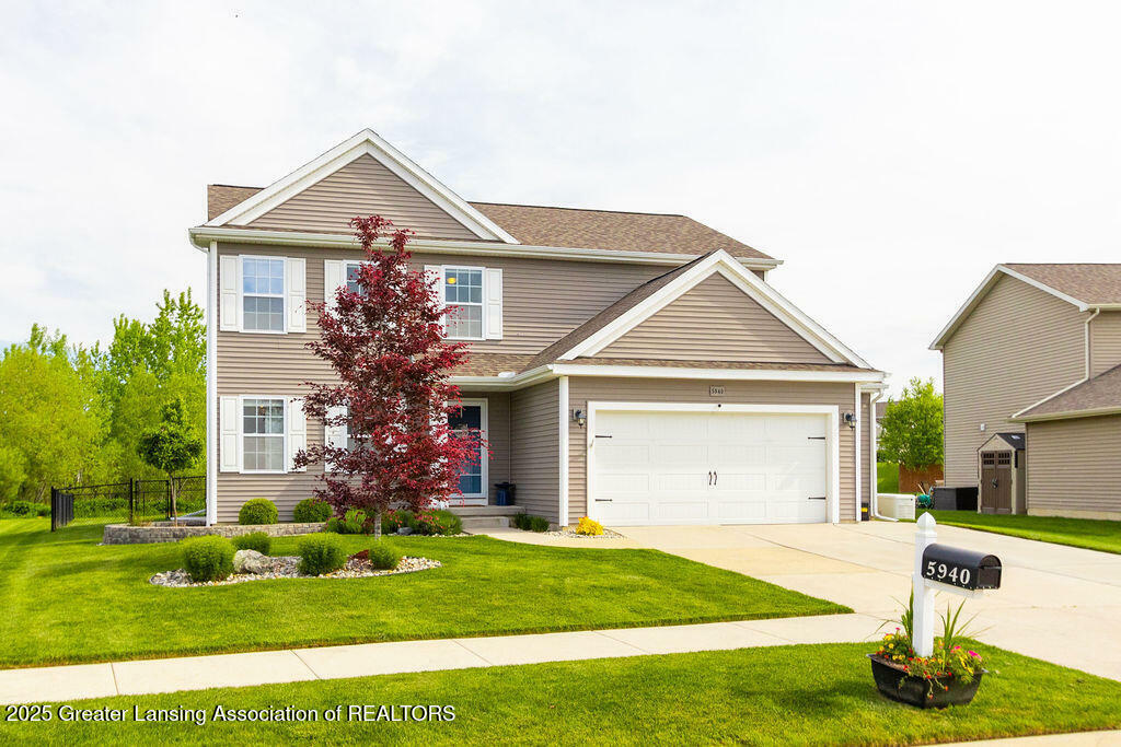 Property Photo:  5940 Boxwood Avenue  MI 48842 