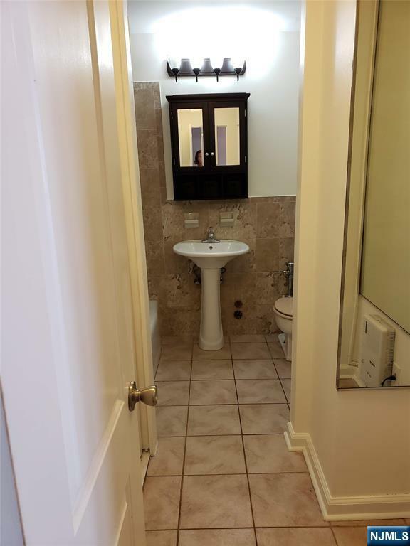 Property Photo:  6050 Kennedy Boulevard 12D  NJ 07093 