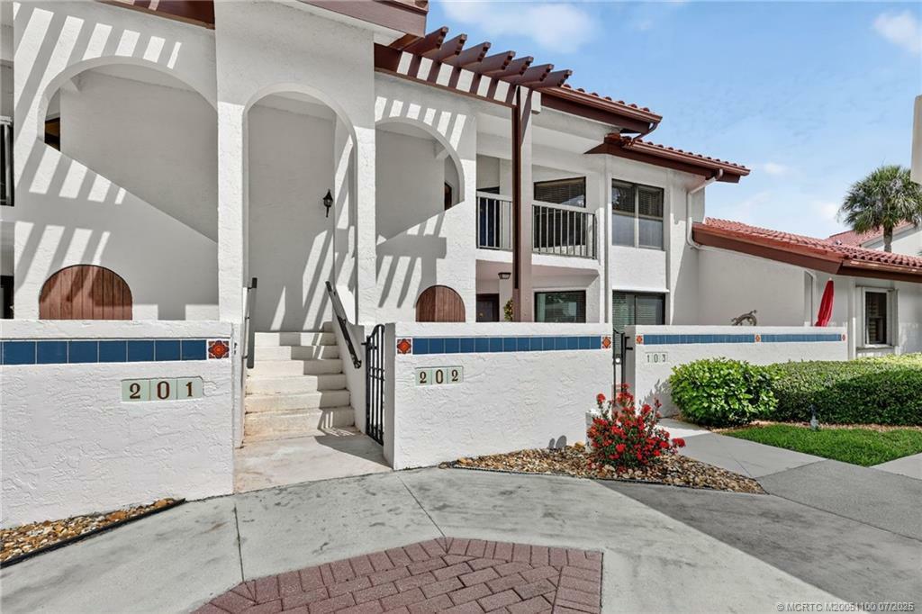 Property Photo:  6060 SE Martinique Drive 202  FL 34997 