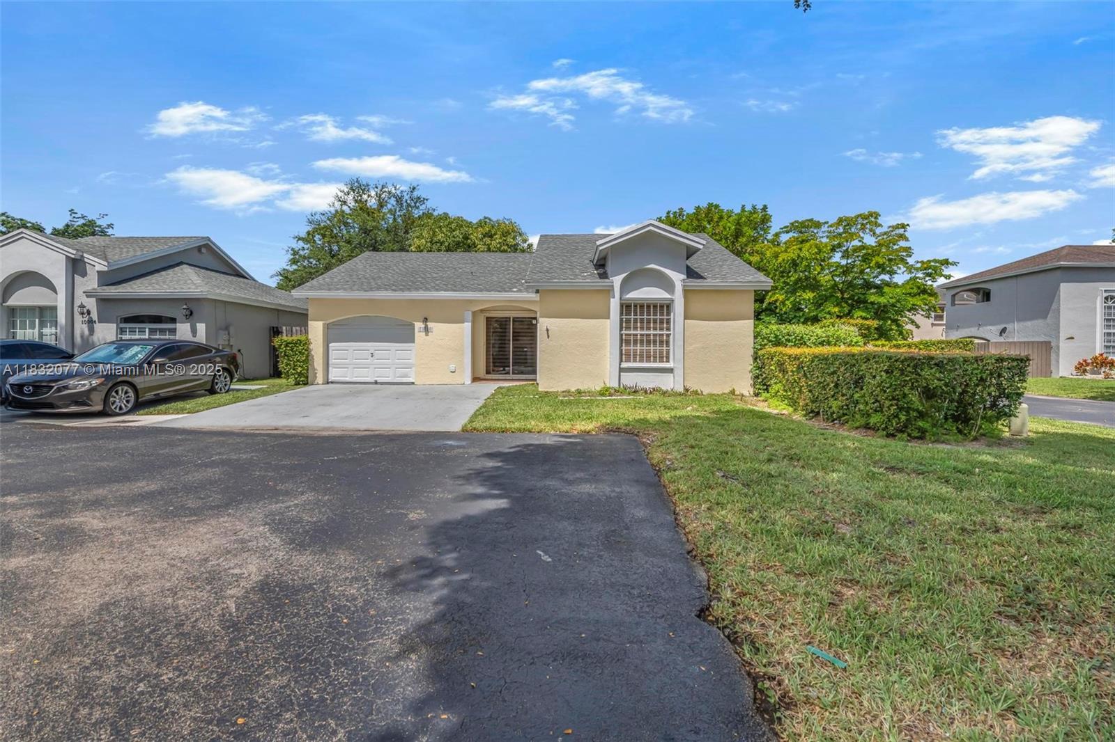 Property Photo: 10016 NW 51st Ter FL 33178