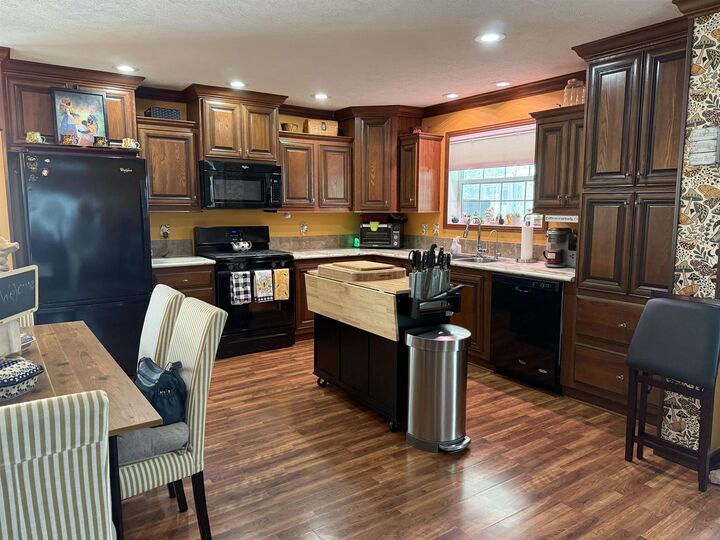 Property Photo: 204 Robinhood Drive NH 03833