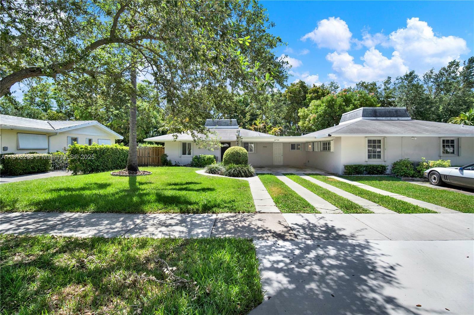 Property Photo:  11713 SW 81st Rd Left Side  FL 33156 