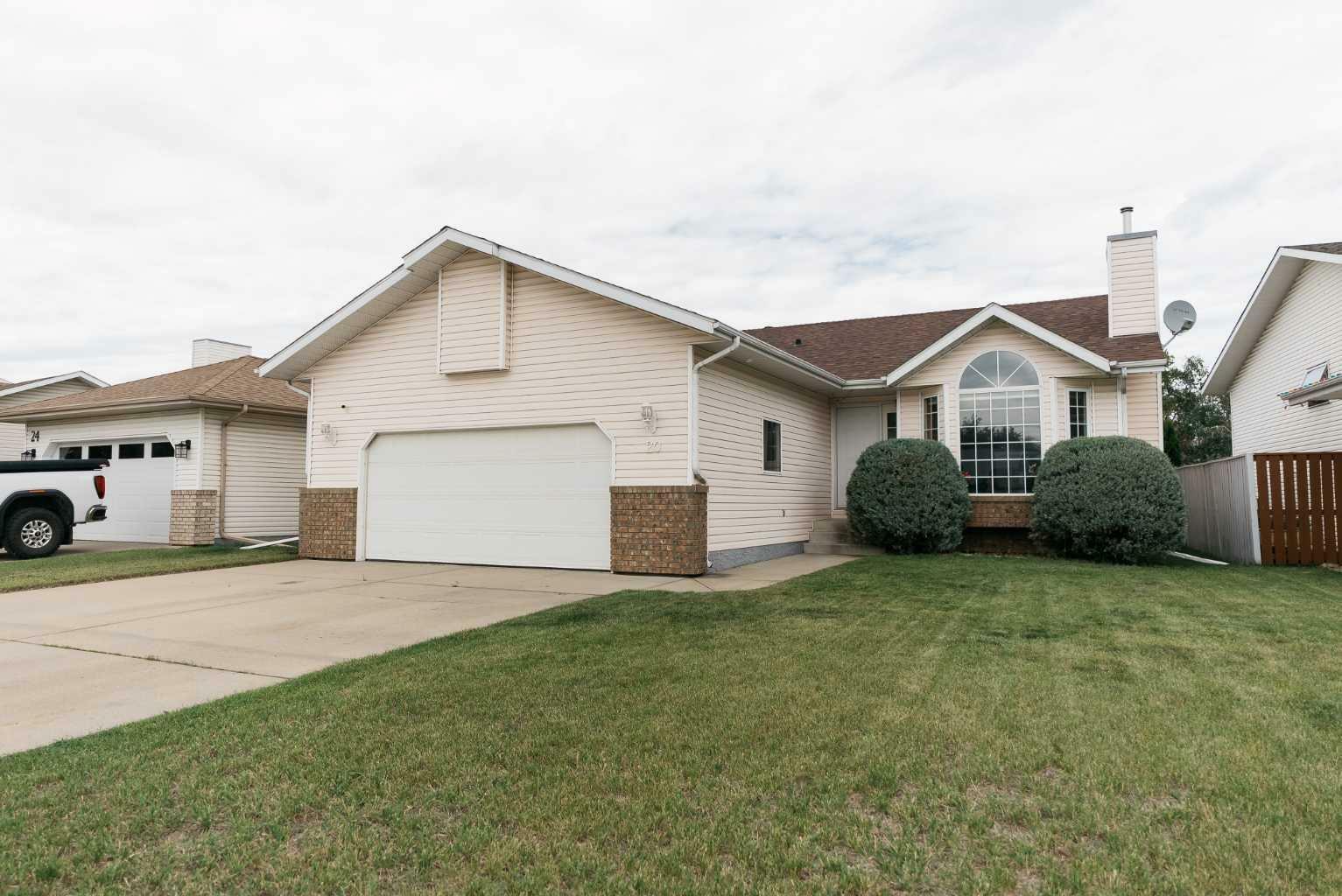 Property Photo: 20 Kirkland Drive AB T4P 3M7
