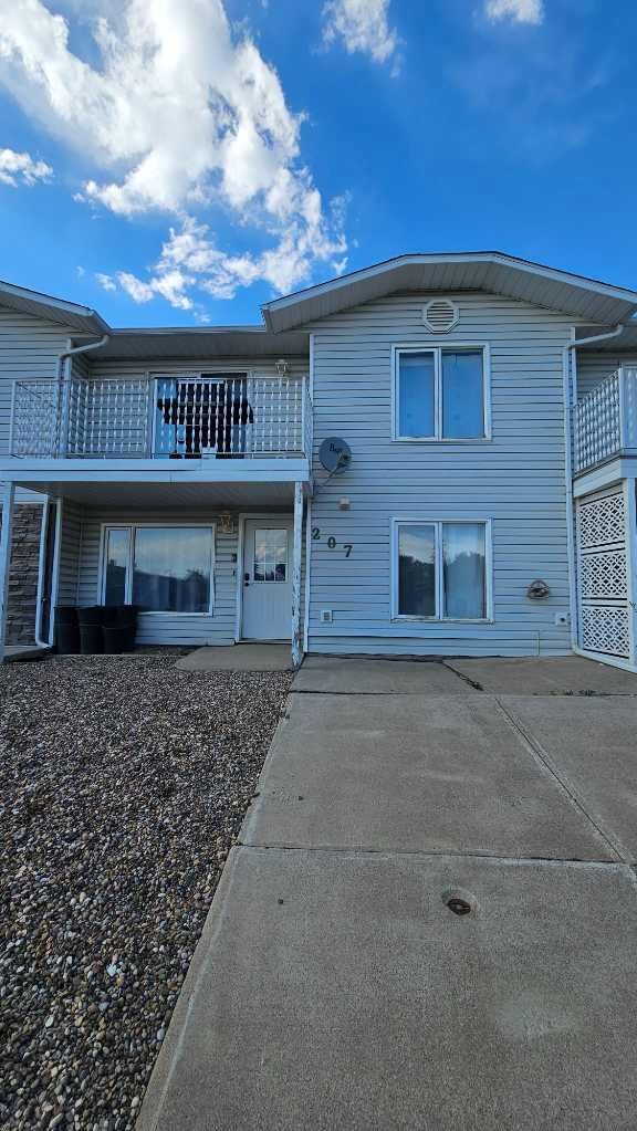 Property Photo: 207 Centre Avenue NE AB T0K 1M0
