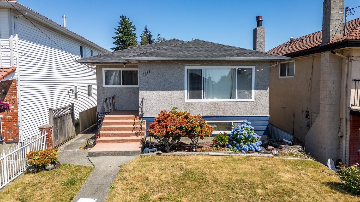 Property Photo:  5679 Clinton Street  BC V5J 2M2 