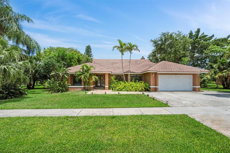 Property Photo: 1440 Chapparel Way FL 33414
