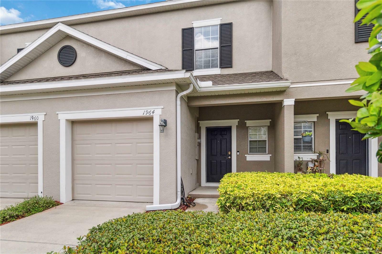 Property Photo: 1964 Compass Flower Way FL 34761