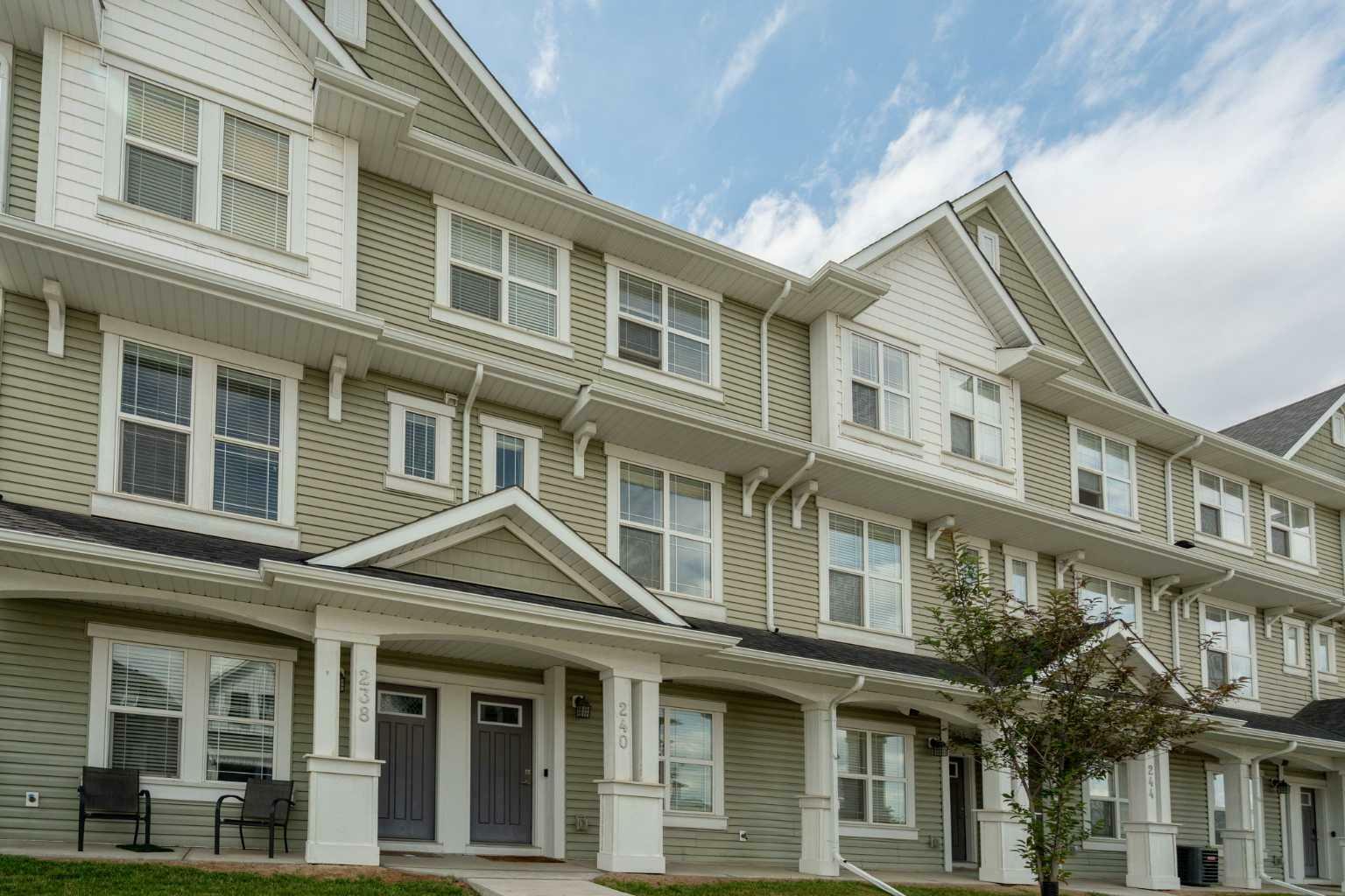 Property Photo: 240 Copperleaf Way SE AB T2Z 5G2