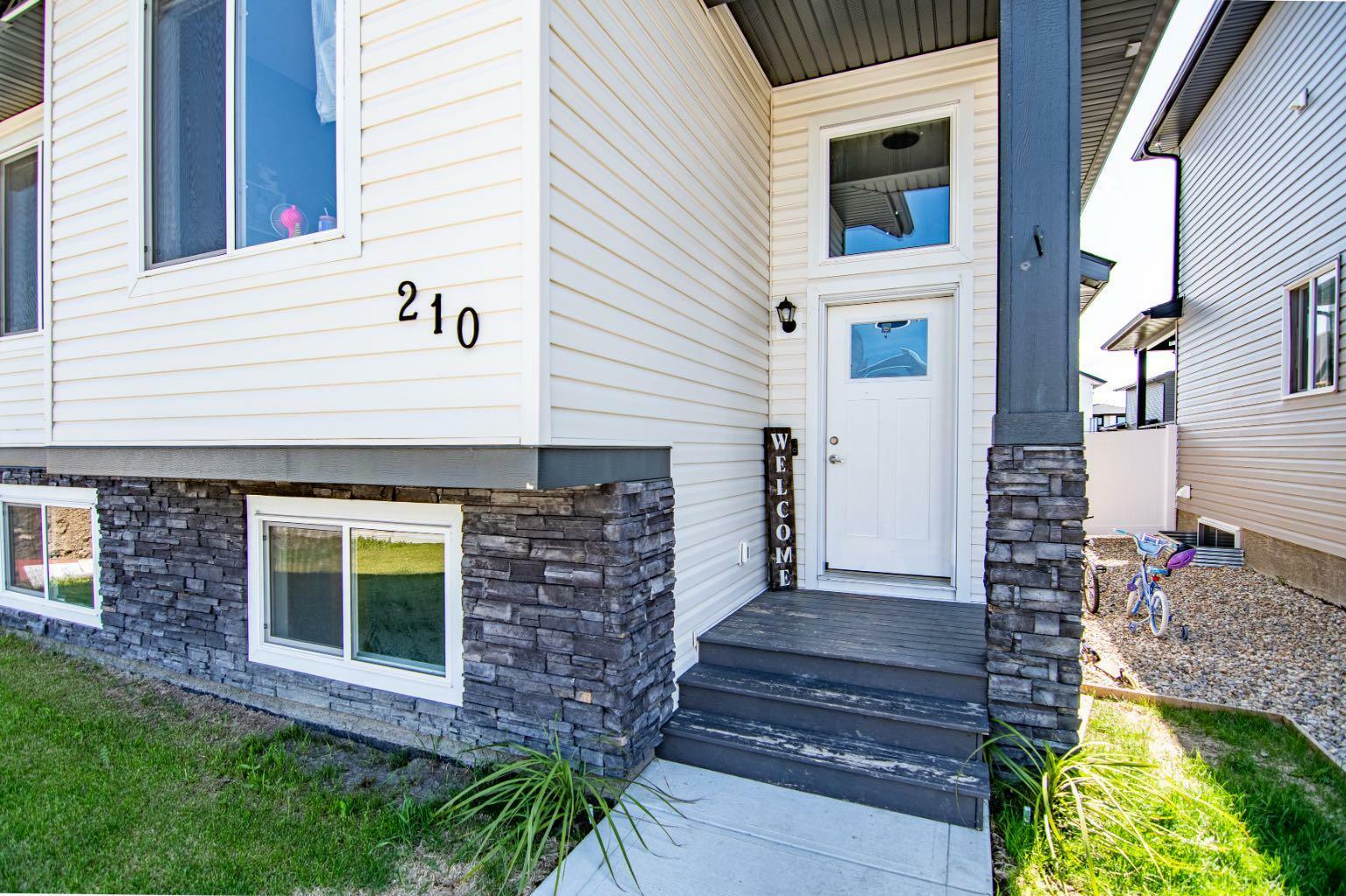 Property Photo: 210 Livingston Close AB T4R 0S8