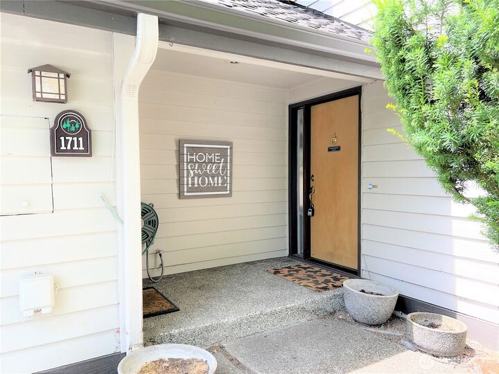 Property Photo:  1711  159th Pl NE 29  WA 98008 