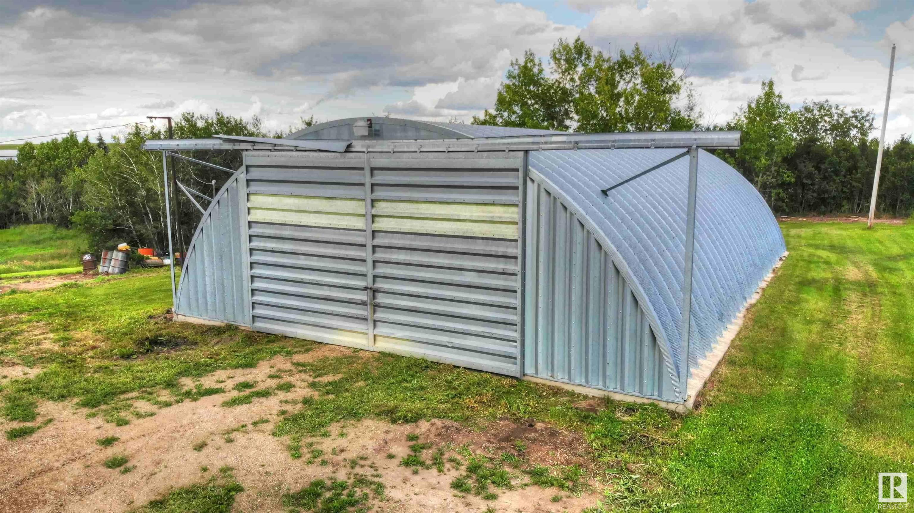 Property Photo: 8318 Twp Rd 572 AB T0A 3A0
