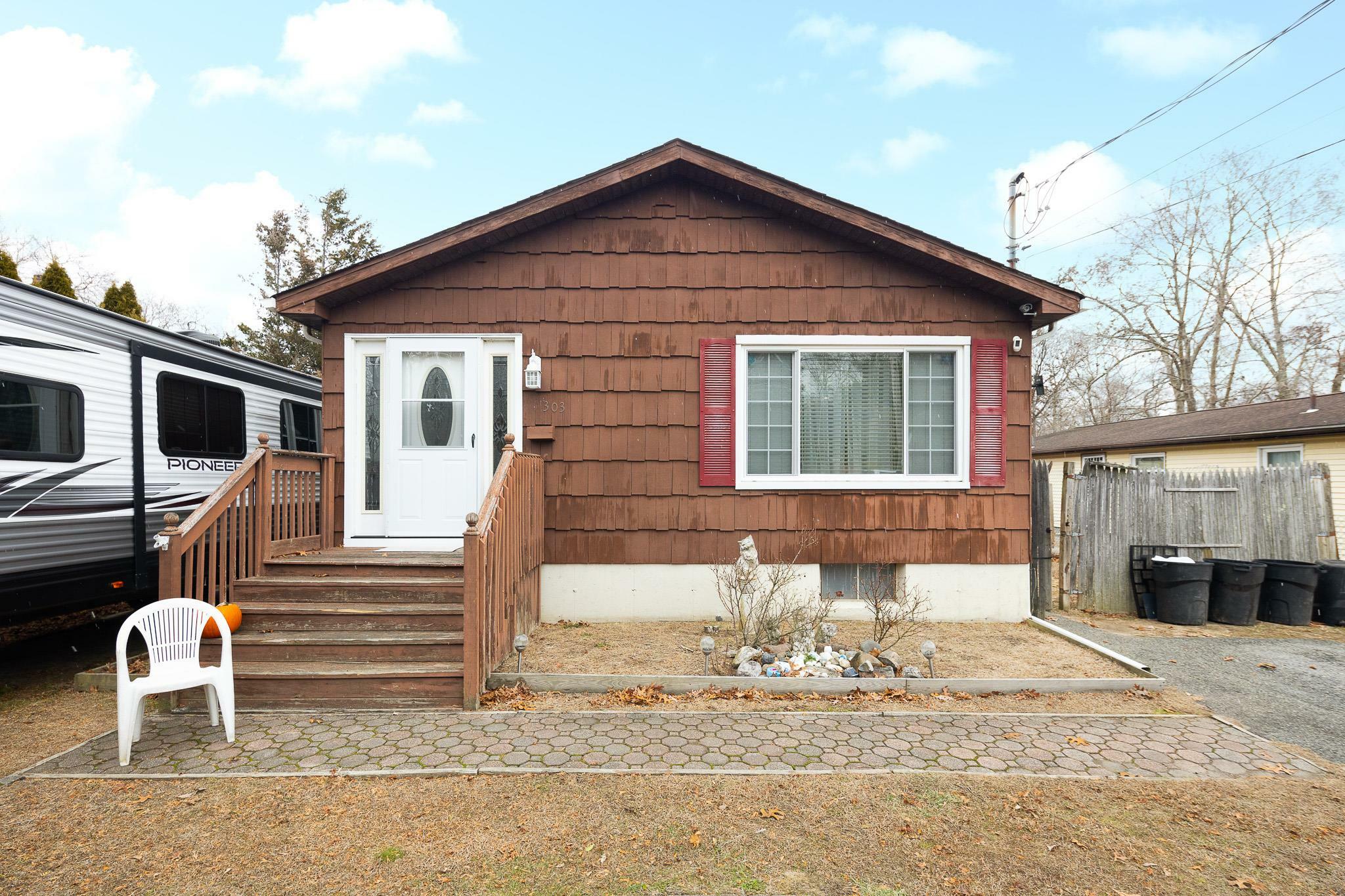 Property Photo: 303 Orchid Drive NY 11951