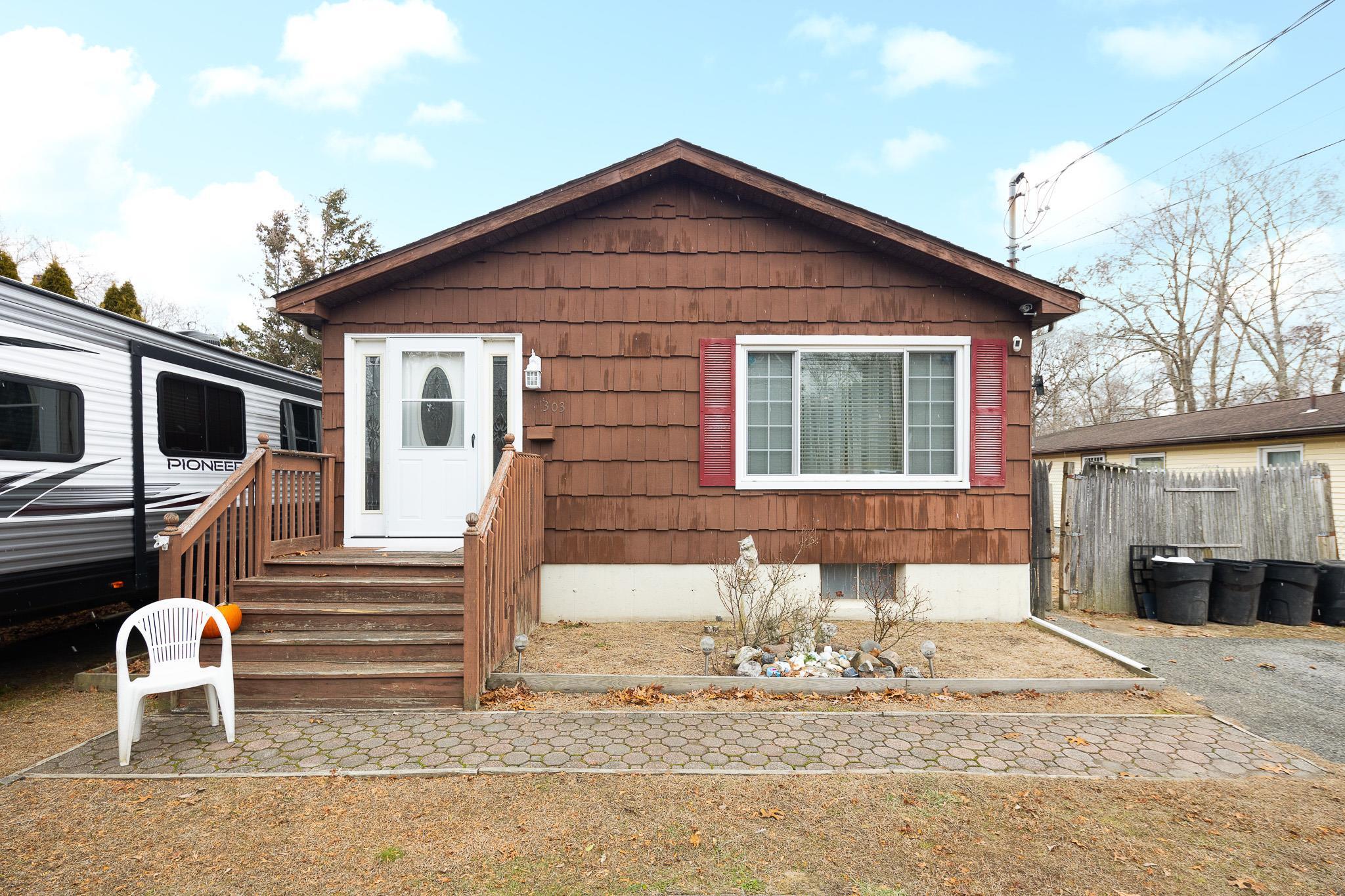 Property Photo:  303 Orchid Drive  NY 11951 