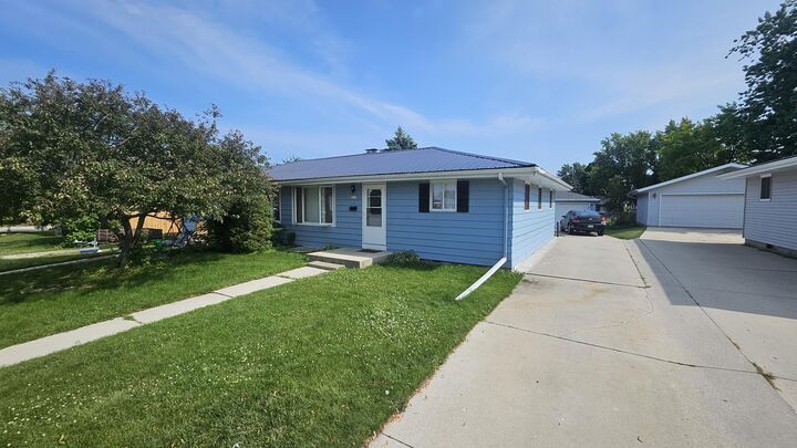 Property Photo: 1319 Greenfield Ave WI 53081