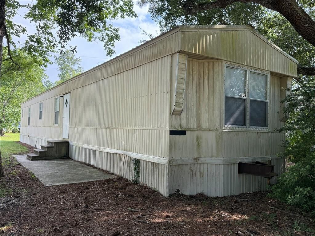 Property Photo: 64096 Mangano Road 106 LA 70452