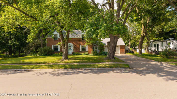 Property Photo:  569 E Holmes Road  MI 48910 